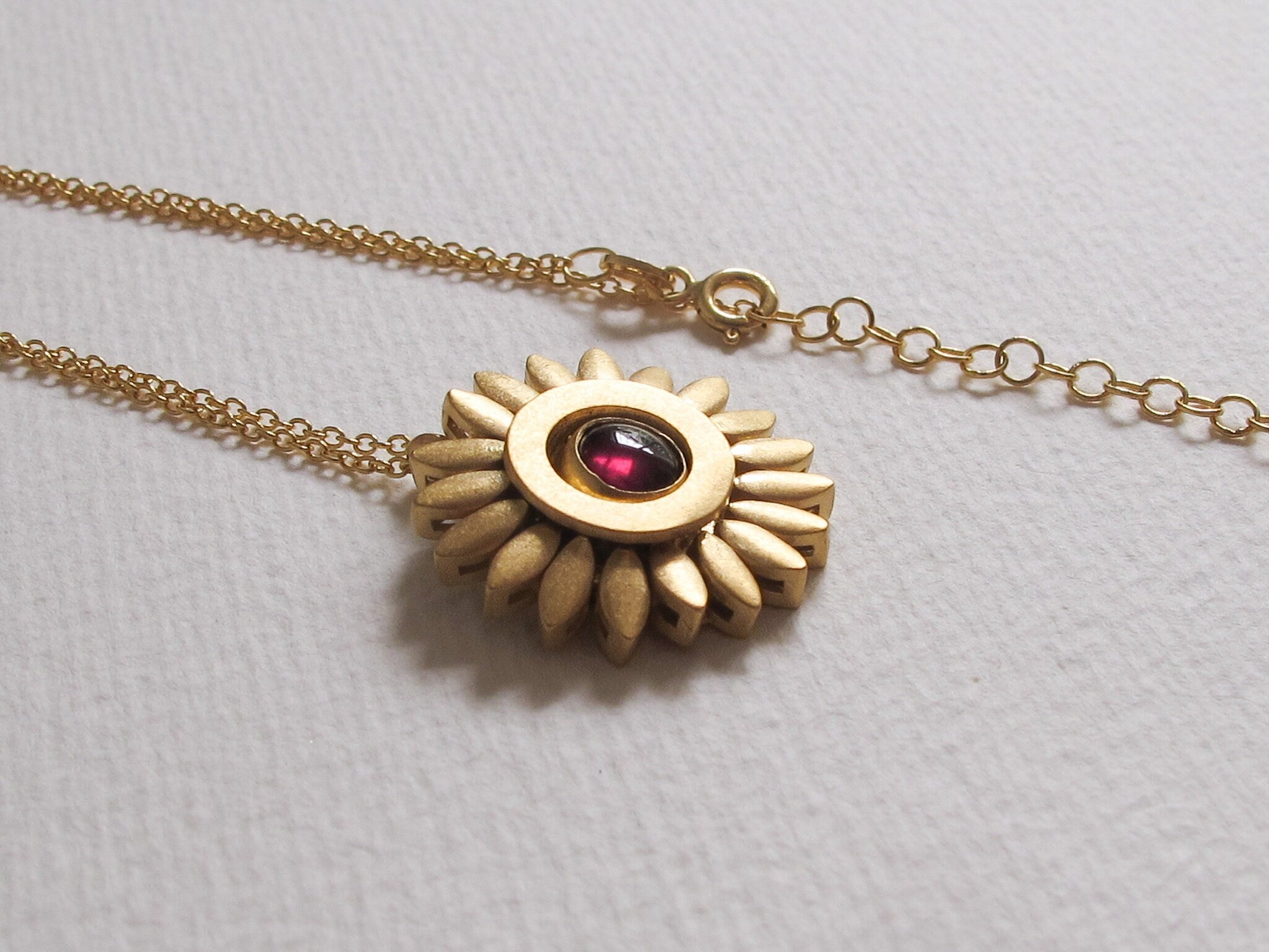 Sunflower Spinning Garnet Necklace