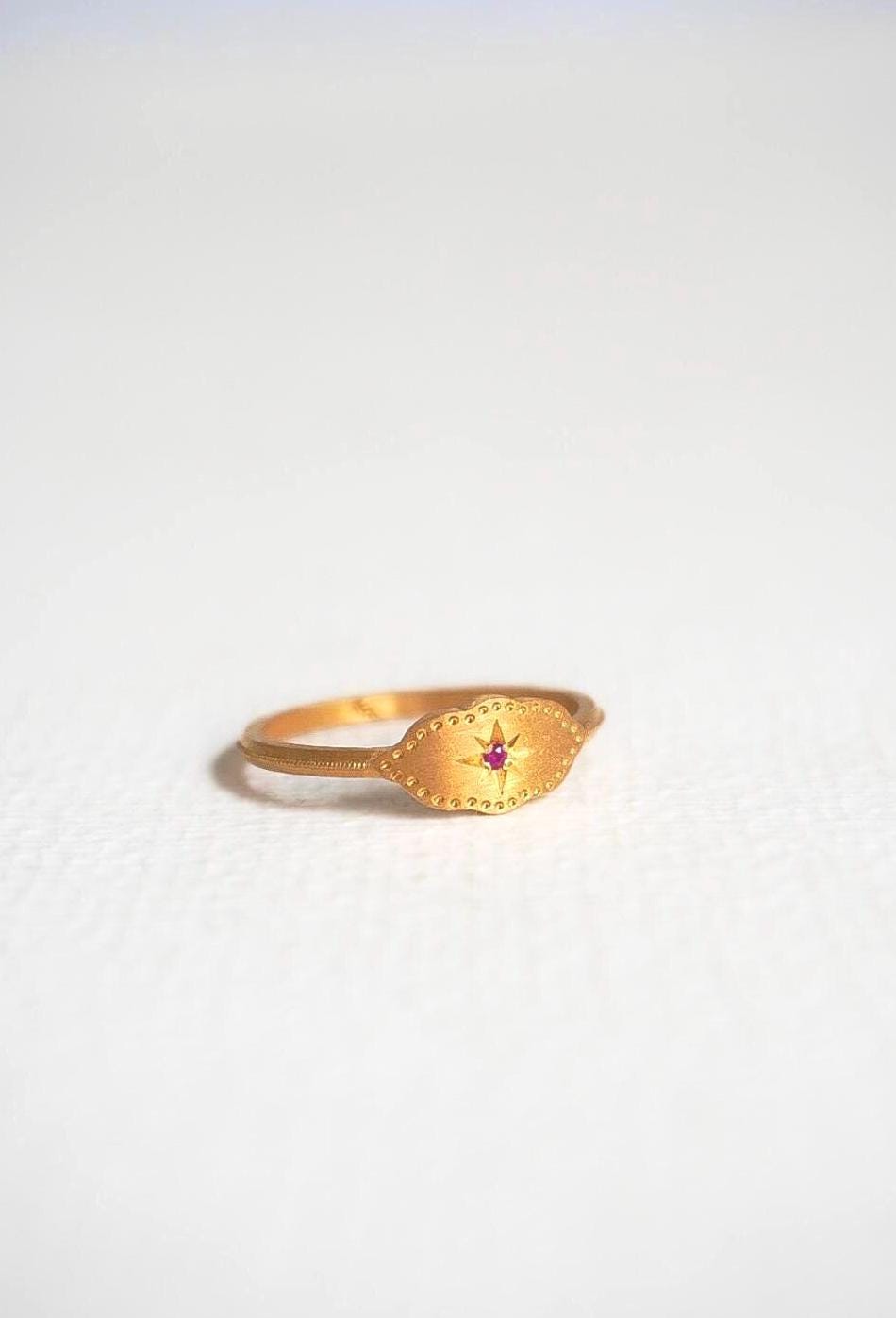 Evil Eye Ring: Star-Set Pink Sapphire